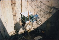 Tractor to remove portions of TBM